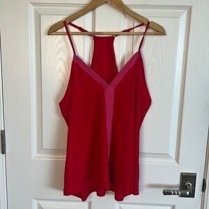 Red tank top. Pink details. Adjustable straps. No brand.